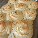sourdough jalapeno rolls in pan cooked